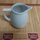 Leiteira de porcelana